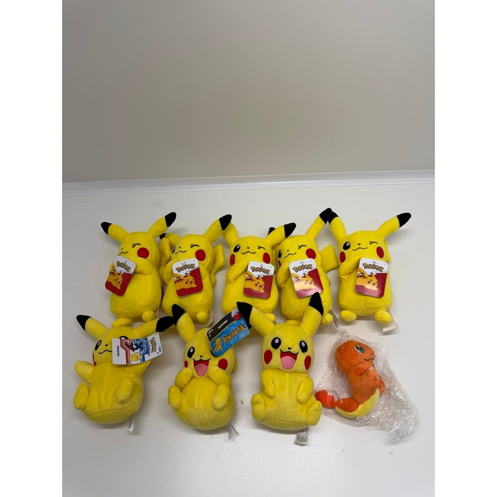 Lot of 8 Pikachu plushies and 1 Charmander all except one pikachu is NWT
